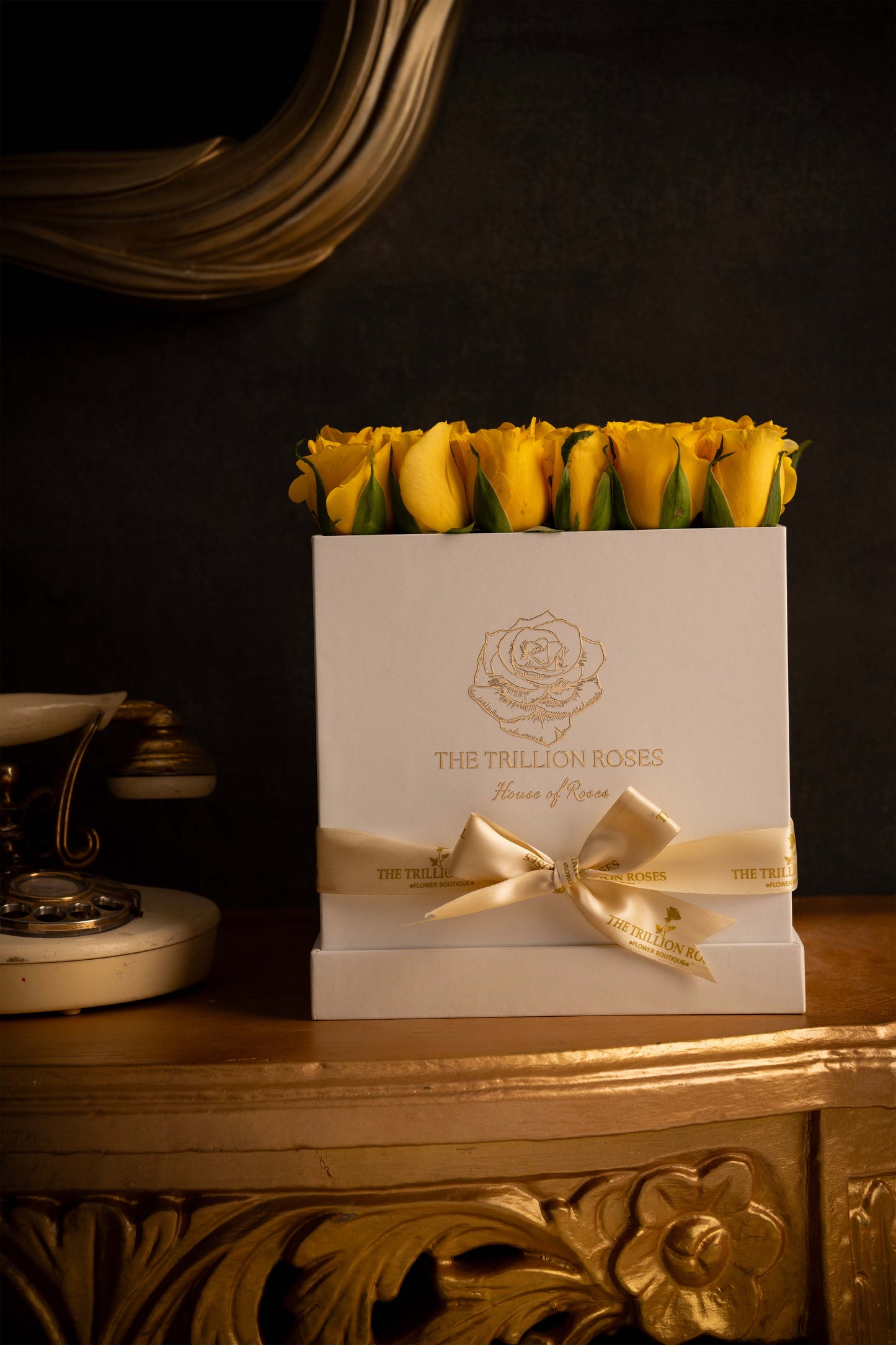 YELLOW SUNSHINE ROSES -  IN BLACK SQUARE BOX.