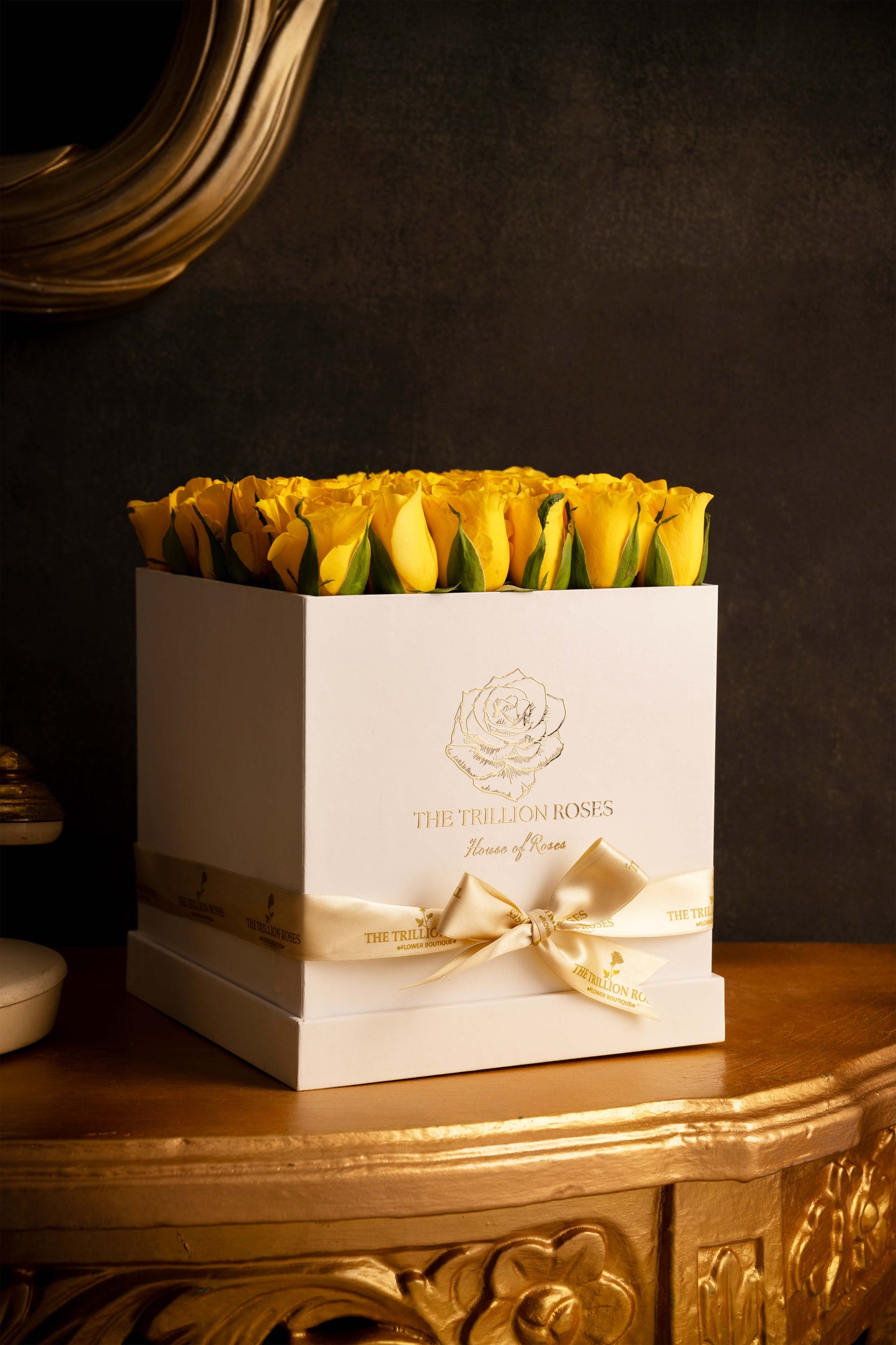 YELLOW SUNSHINE ROSES -  IN BLACK SQUARE BOX.